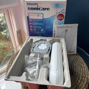 Philips Sonicare deluxe charger and hard travel case only - no brush - open box